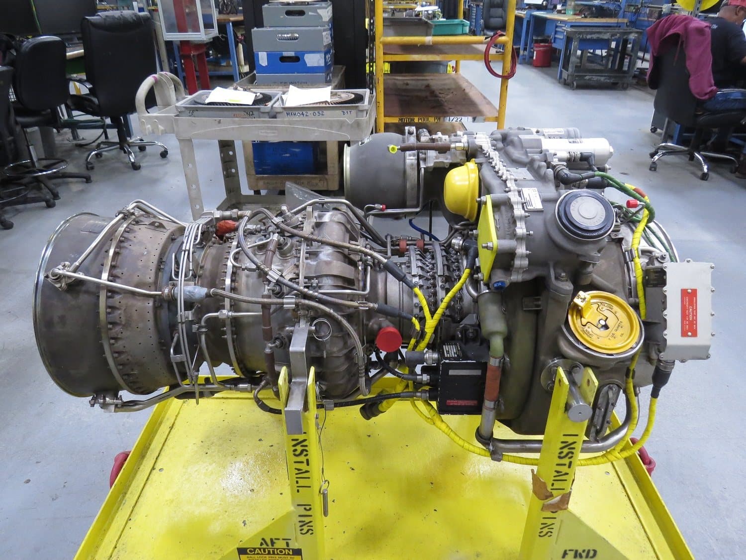 Complete T700 engine on a stand, front three-quarter view